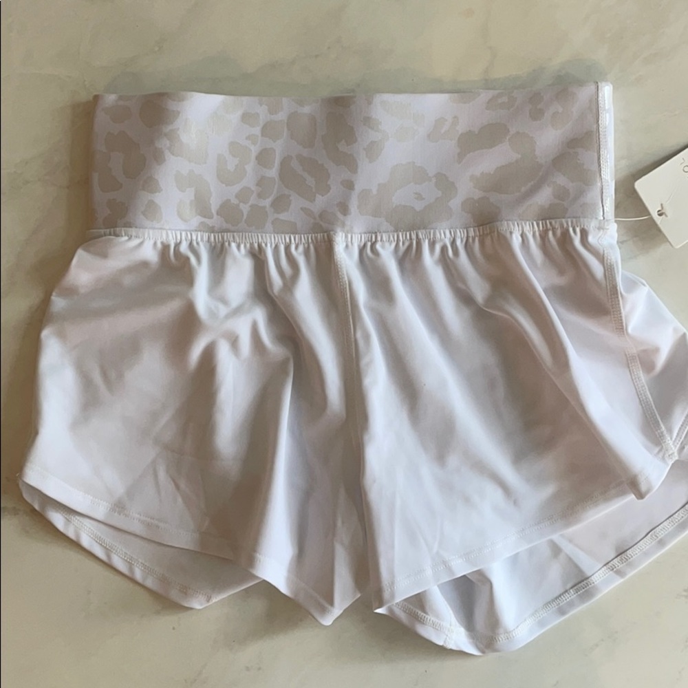 White leopard gym running shorts